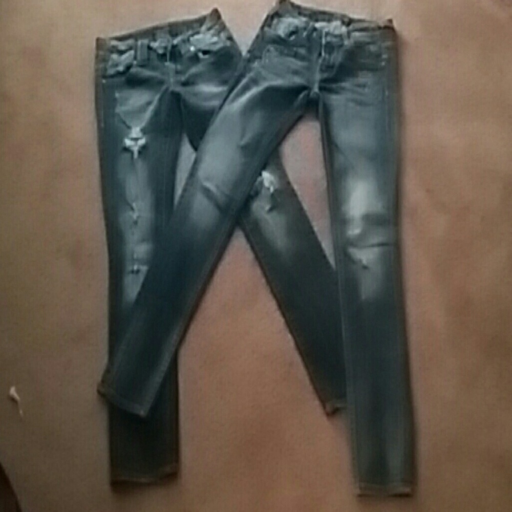 (2) Pairs of designer jeans  VIGOSS